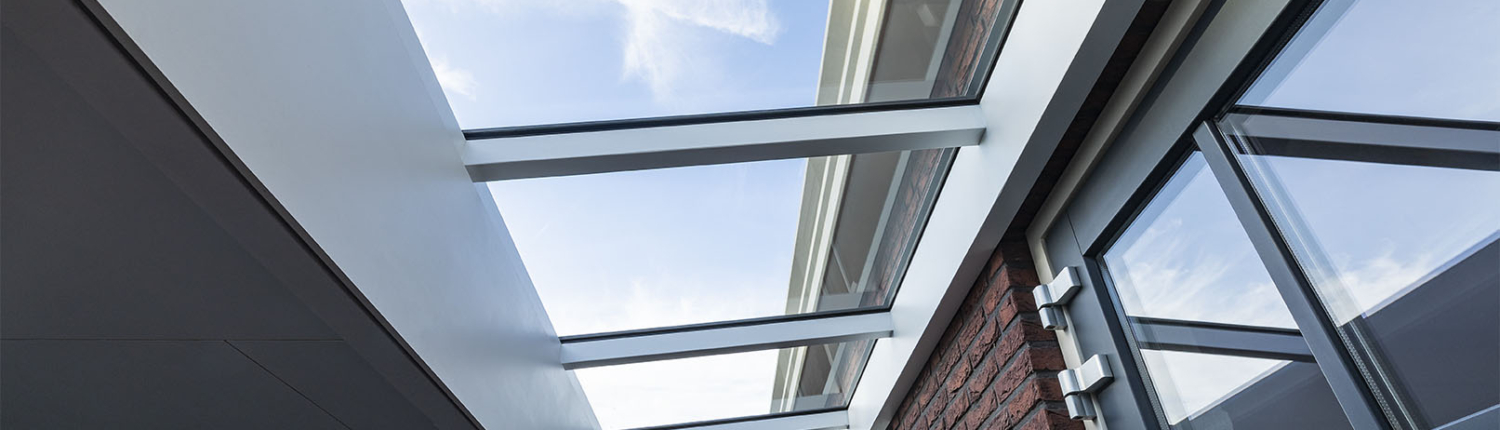 lessenaarsdak lichtstraat skylar onder glas